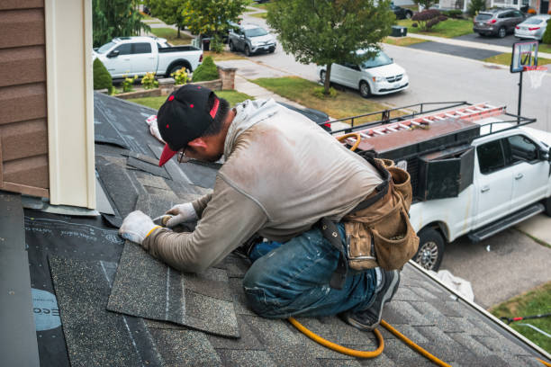Professional Roofing technician working in Long Beach, MS